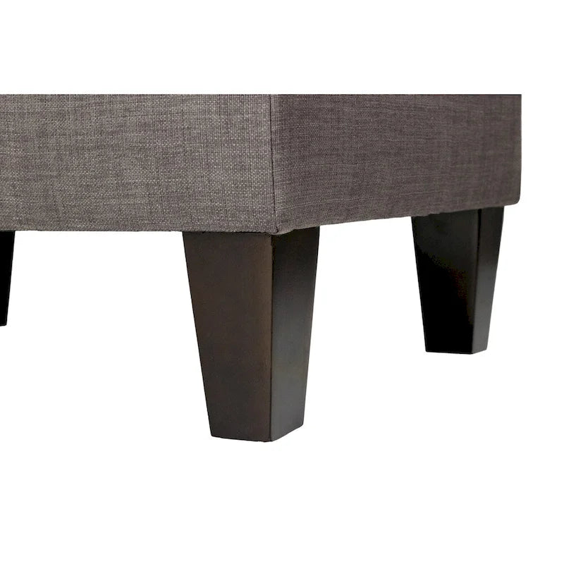 Tabouret rembourré à passepoil