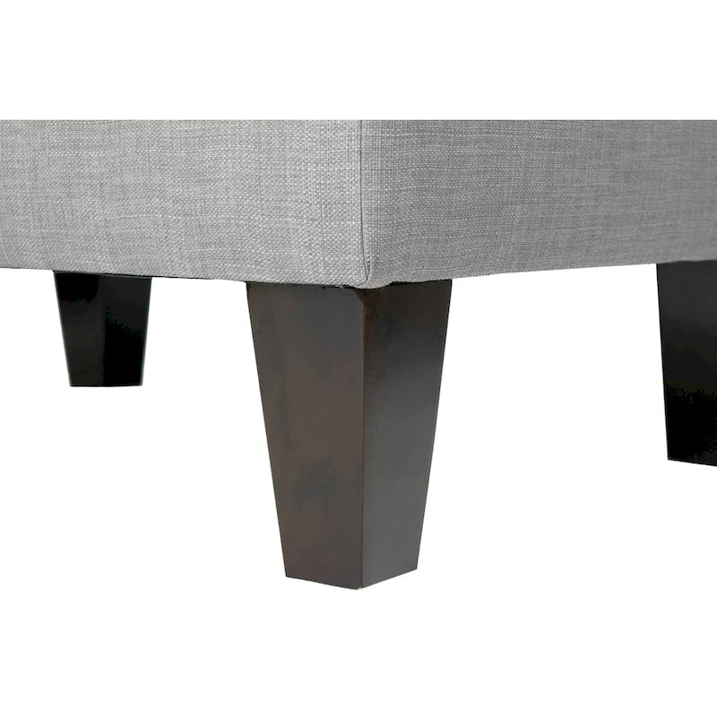 Tabouret rembourré à passepoil