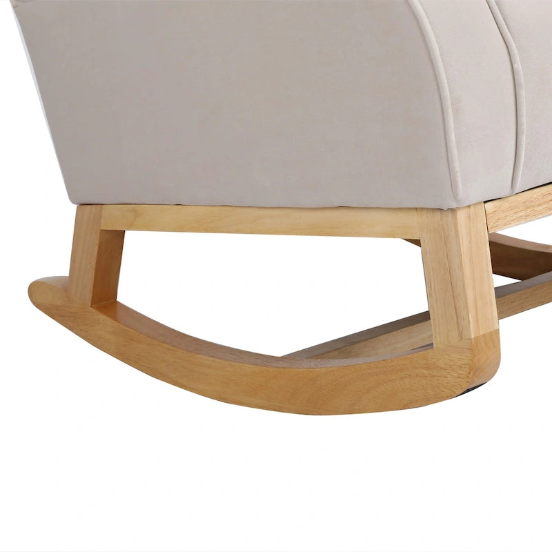 Fauteuil à bascule capitonné à dossier haut