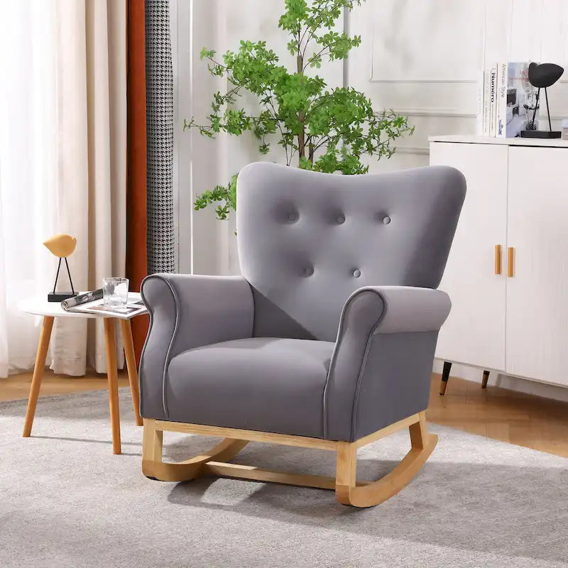Fauteuil à bascule capitonné à dossier haut