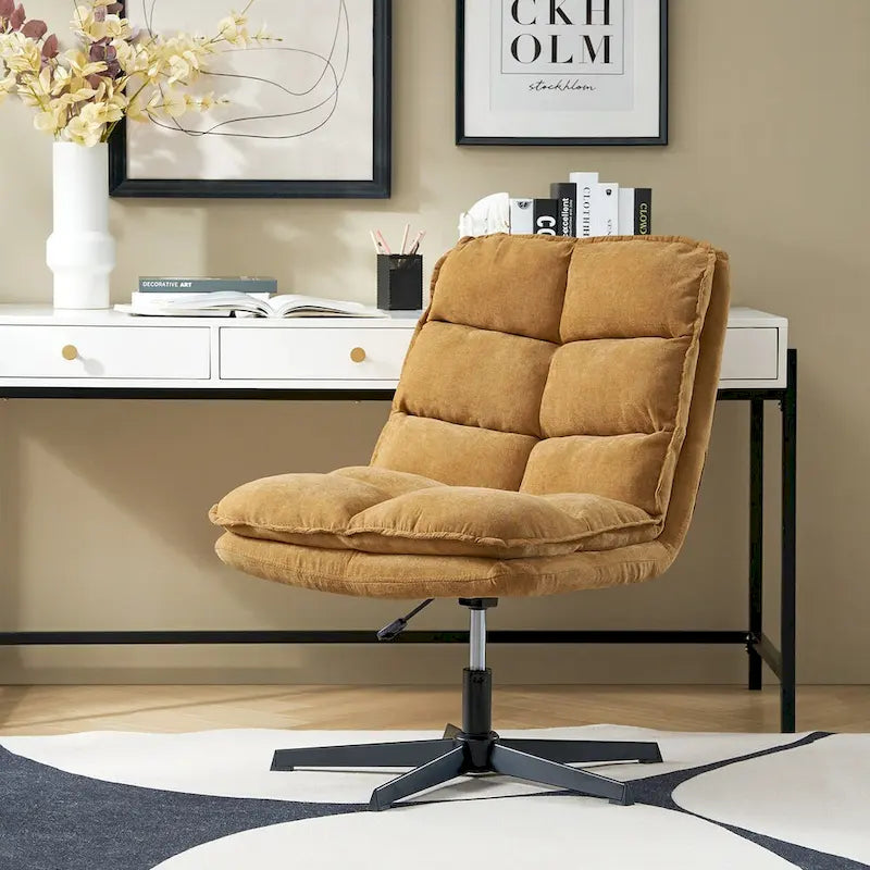 Chaise de bureau moderne sans accoudoirs — design capitonné, pivotante à 360 degrés.