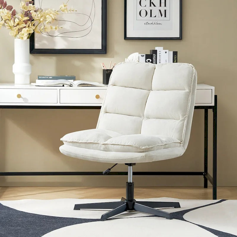 Chaise de bureau moderne sans accoudoirs — design capitonné, pivotante à 360 degrés.